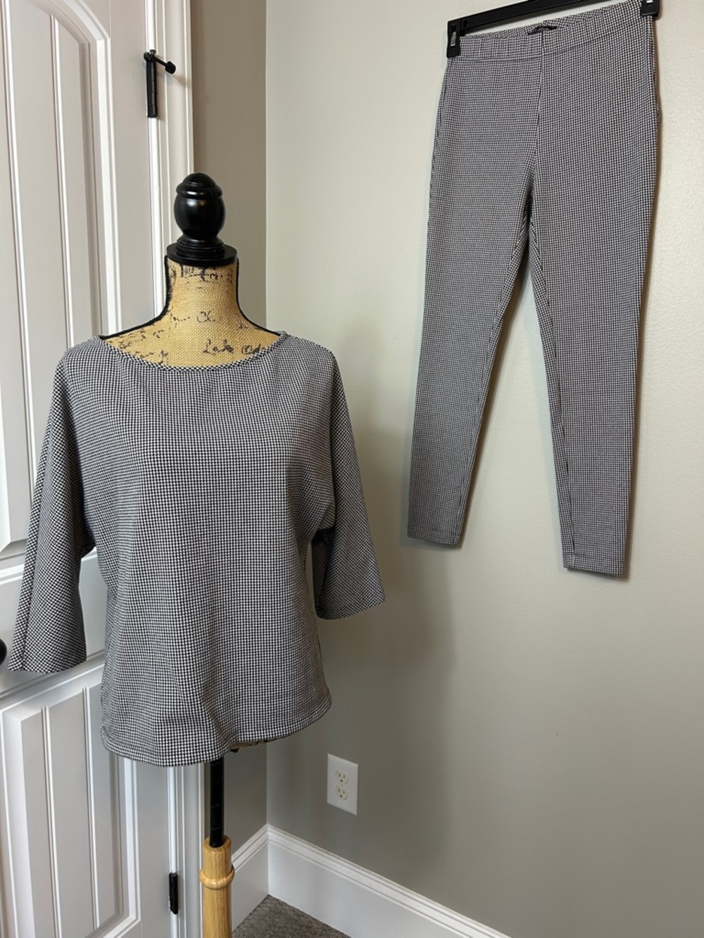 St. John medium top, small pants, black and white selling together as a set.